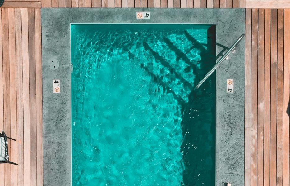 Overhead view of a clear turquoise lap pool